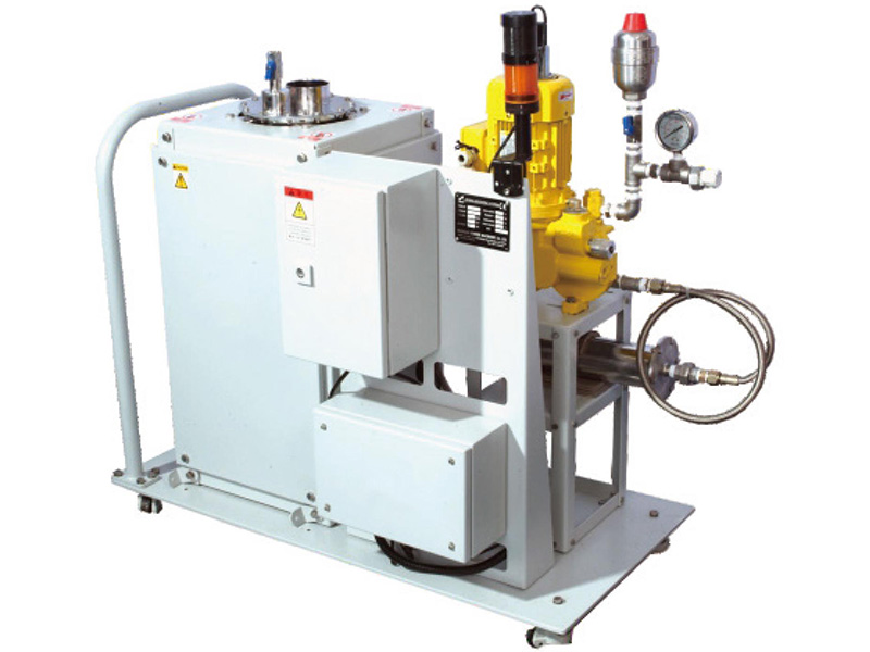Volumetric liquid metering system